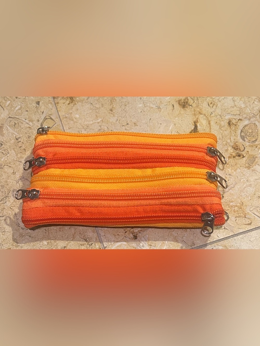 Striped Two Tone Orange 7 Zipper Pouch